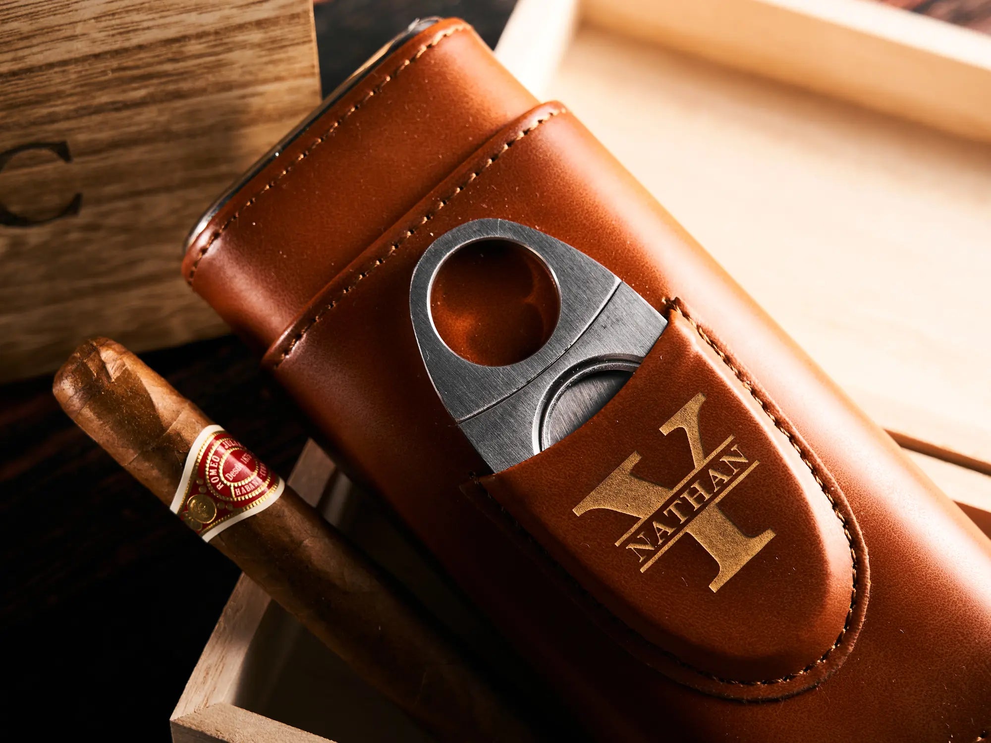 Brown cigar case in wooden box